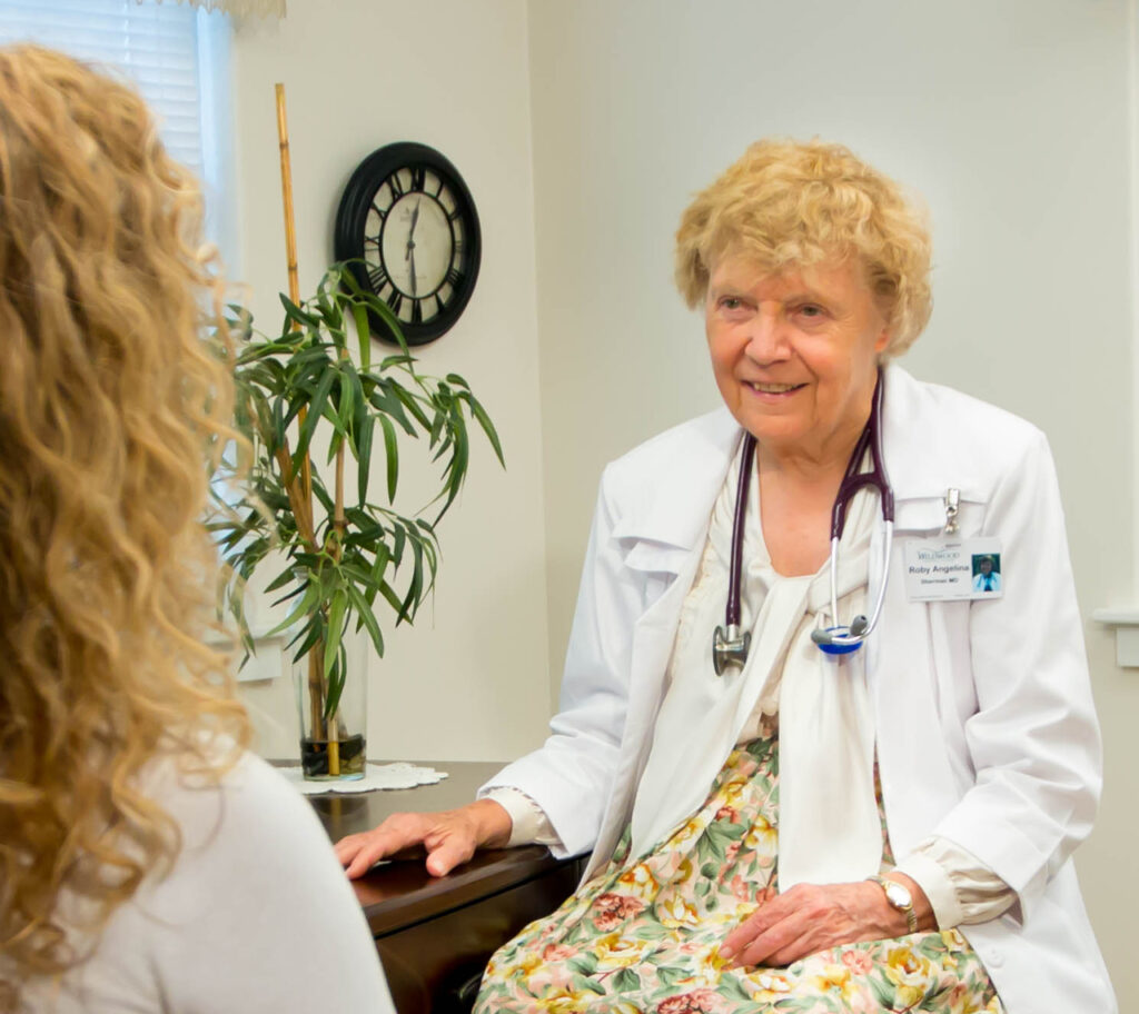 Wildwood physician meeting one-on-one with a guest